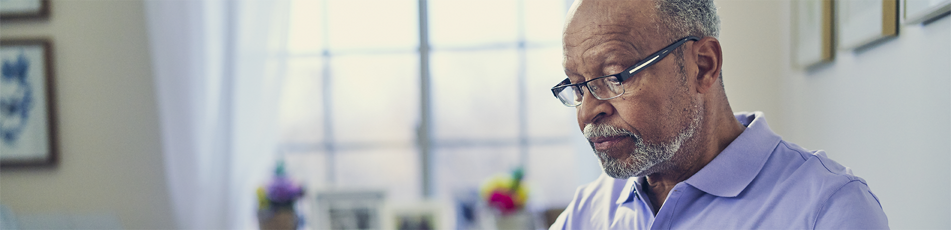 older man on a computer